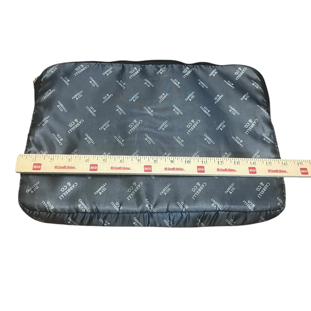 Silver and black Cabrelli & CO. inner laptop case
